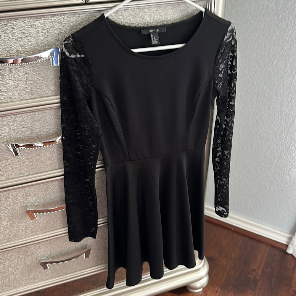 Size small long lace sleeved black dress